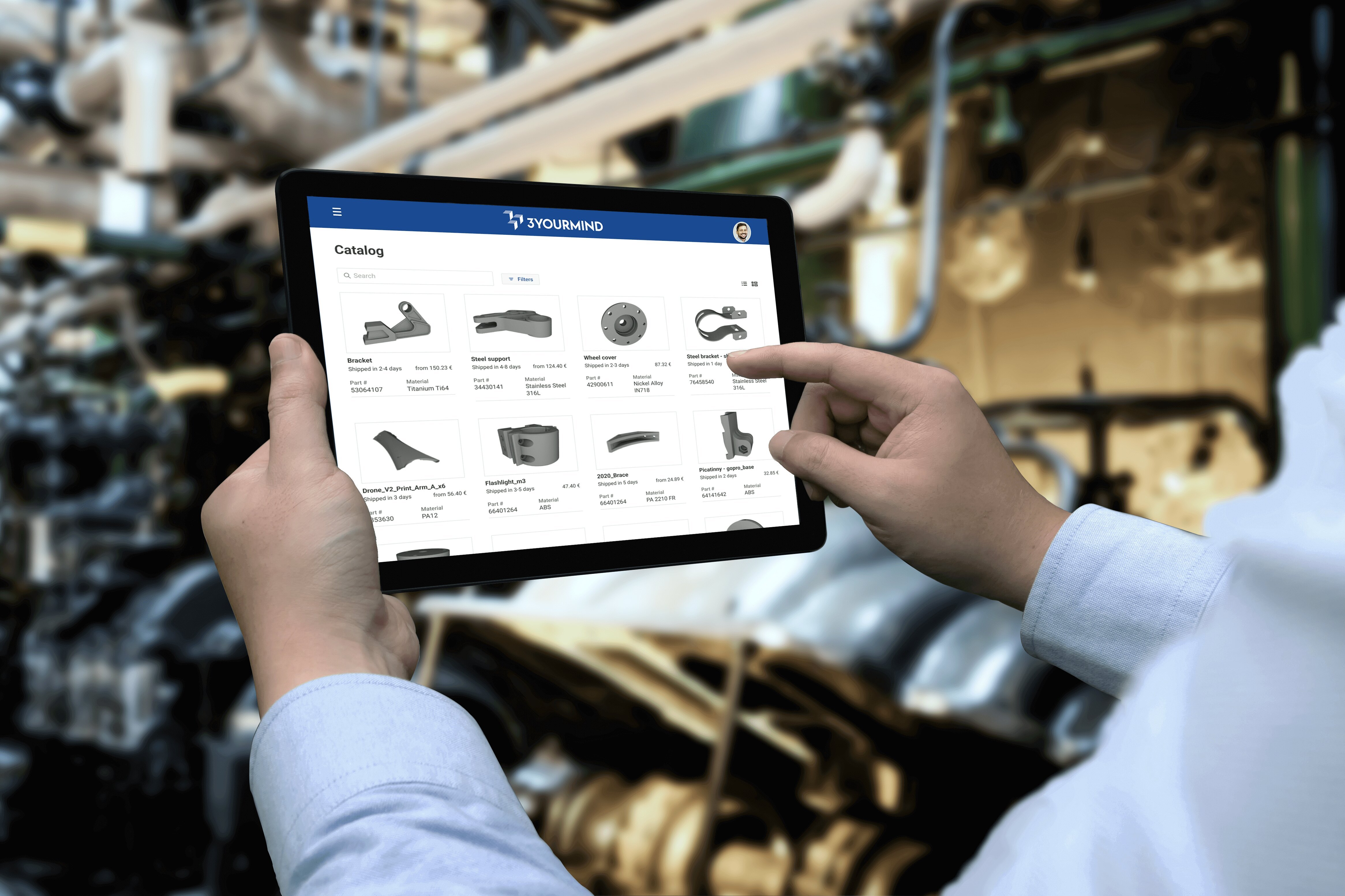 Man in factory looking at tablet with 3YOURMIND digital inventory software features