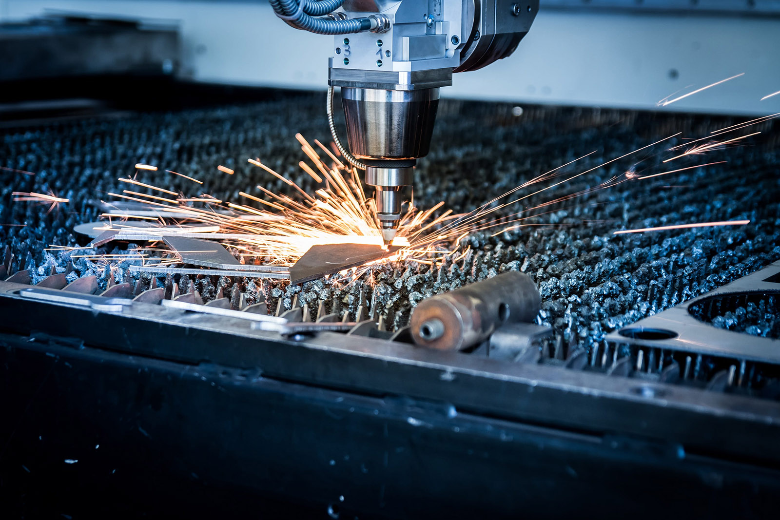 Robotic Arm Welding a Part in Production